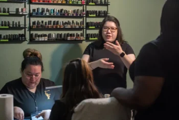 Aurora Le, PhD, trains nail salon staff on healthy lifestyle practices